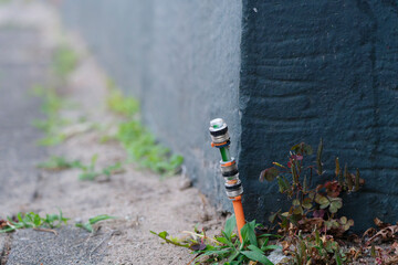 Fiber optic connection was installed between the footpath at paving stones and the house wall