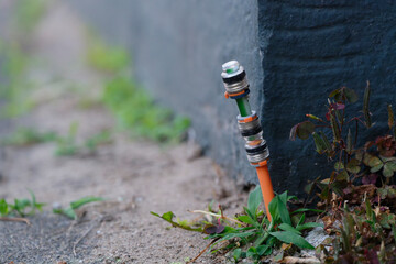 Fiber optic connection was installed between the footpath at paving stones and the house wall