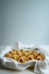 Celebrating Swiss National Holiday. Homemade buns called 1 August-Wegge in German are in the bread basket with grey background.