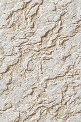 Obraz premium Aged brown sandstone wall with a rough, weathered rock texture and a natural, grunge pattern