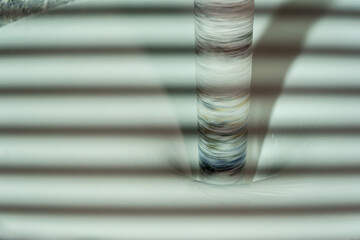 Industrial elegance - capturing the precise moment of acrylic paint production. The cycle of...