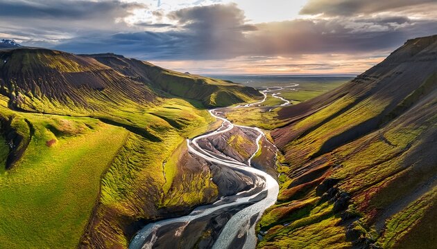 aerial view of the winding river through highlands in a beautiful and pristine landscape hella southern region iceland