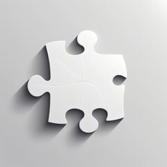 Unique white puzzle piece resting against a smooth gray background in a modern and minimalist design setting