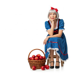 Elderly woman waiting sitting head in hands beside apple basket, symbol of disappointment, failed expectations, missed opportunity, long wait and twist of fate on white background, old Snow White