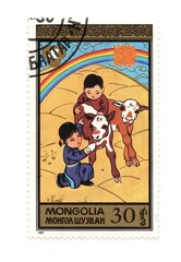 A vintage postage stamp from Mongolia isolated on a white background.