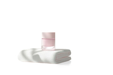 Pink Skincare Products on Folded Towels on a transparent background