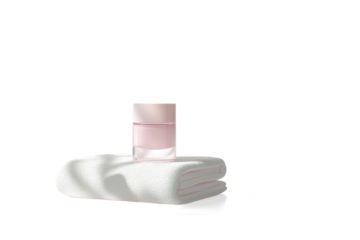 Pink Skincare Products on Folded Towels on a transparent background