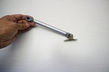 Piston for furniture and overhead doors