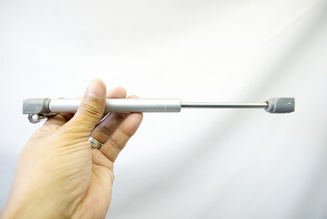 Piston for furniture and overhead doors