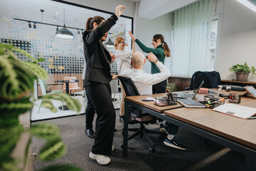 Group of people dynamically interacting and exchanging ideas in a contemporary workspace,...