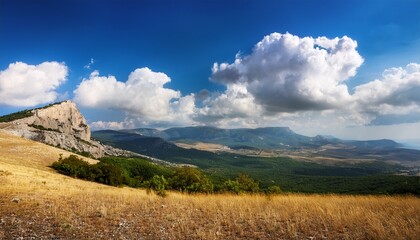 beautiful cumulus clouds over mountains and valleys of crimea t