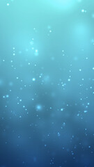 Blue bokeh glitter particles background