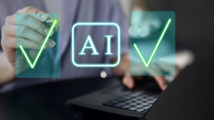 A person using laptop with approved AI symbol on virtual screen for check mark AI.
