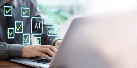 A person using laptop with approved AI symbol on virtual screen for check mark AI.