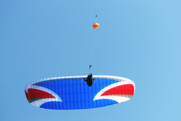 Paraglider being towed by a winch