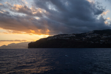 Sunset over coastal town horizontal © Stoca