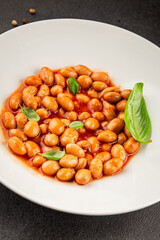 Bean stew tomato sauce cranberry beans vegetable dish beans borlotti fresh delicious gourmet food background on the table rustic food top view copy space keto and paleo diet vegan and vegan food