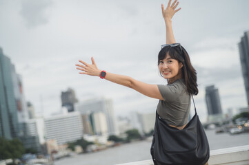 Happy solo young southeast asian woman teenager blogger world travel tourism. Local cultural...
