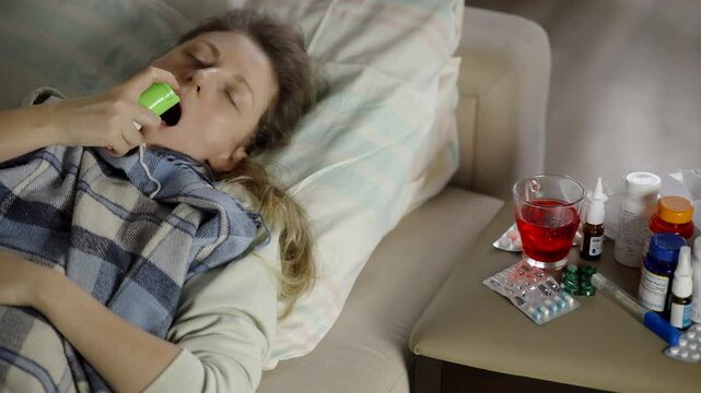 Using Inhaler For Asthma Relief. Person Suffering From Respiratory Disease And Bronchitis