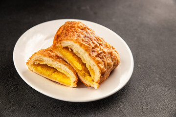 Triangle cake almond puff pastry sweet dessert fresh delicious gourmet food background on the table rustic food top view copy space