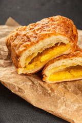 Triangle cake almond puff pastry sweet dessert fresh delicious gourmet food background on the table rustic food top view copy space