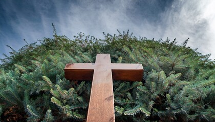 eucalyptus greenery and religious cross