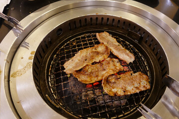grilled meat on the stove