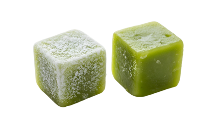 Two Green Cubes Displayed on Transparent Background, One Covered in Powder, Close-Up