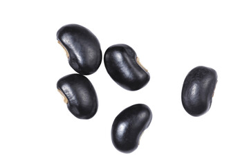 Black beans. Isolated on white background. Top view.	
