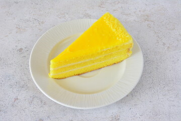 Slice of Lemon Cake on a Plate flat lay