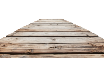 Scenic wooden pier extending over sandy beach with ocean waves and coastal atmosphere isolated on white background
