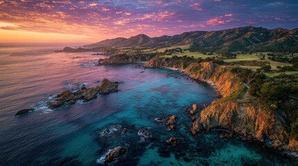 Vibrant coastal landscape at sunset with rocky cliffs and tranquil waters reflecting colorful skies.