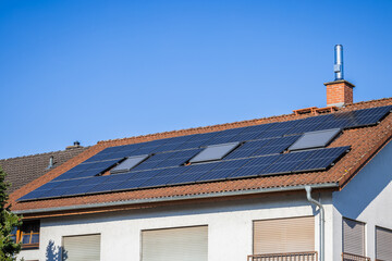 Photovoltaic panels on the roof of family house, solar panels.