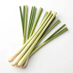 Fresh lemongrass stalks arranged in a fan shape, isolated on white background with subtle green shadows