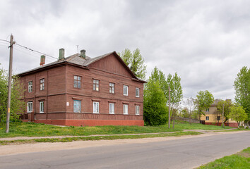 Wooden old barrack-type house, old housing in a big city