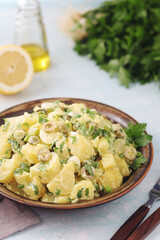 A bowl with Greek potato salads
