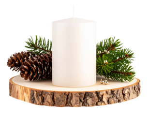 A Christmas candle in the exposition with a pine cone and juniper twigs on a cherry c  
