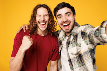 Close up young happy two friends buddies men they wear casual clothes together do selfie shot pov...