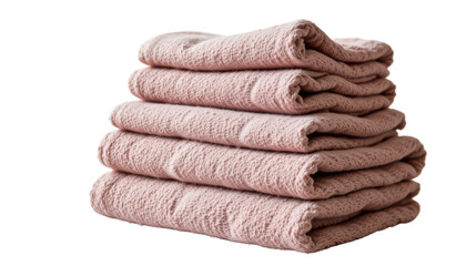 stacked towels in neat piles against a dark background