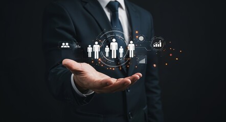 Businessman holding digital icons of people symbolizing HR tech, recruitment, team management, employee analytics, leadership, and modern human resources systems. Hiring data.