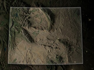 Detailed night map of Wyoming with clear state borders and glowing city lights. Contains modified Copernicus Sentinel data 2025.