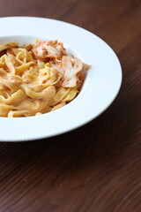 Creamy mushroom and chicken Mediterranean Italian Tagliatelle Pasta close up
