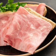 Sandwich ham slices meat spam pork fresh gourmet food background on the table rustic food top view...