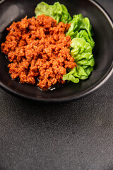 Tuna tomato sauce canned fish seafood fresh delicious gourmet food background on the table rustic food top view copy space keto and paleo diet vegan food pescetarian diet