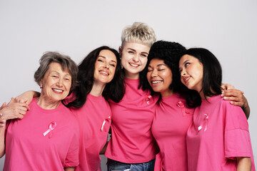 Diverse women uniting in support for breast cancer awareness
