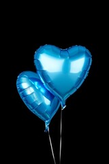 Blue heart balloons on black background, perfect for celebrations and valentine's day designs
