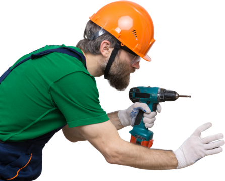 A male locksmith installs a door in an apartment. The guy works with a screwdriver.