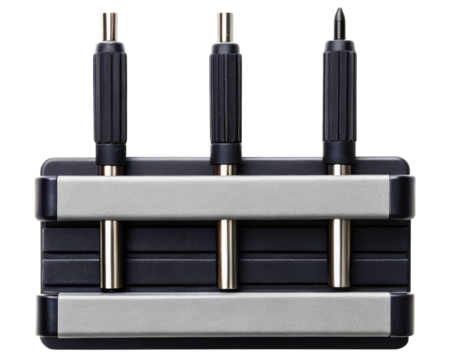 Set of three precision screwdrivers in a tool holder stand on a transparent background
