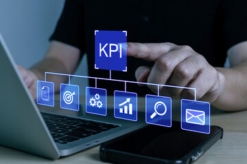 KPI. manager analyzing key performance indicator data on laptop computer, online advertising technology, digital advertisement, financial business, business strategy, online marketing concept