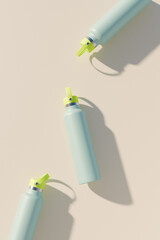 Blue water bottles on a beige surface. 3d rendering